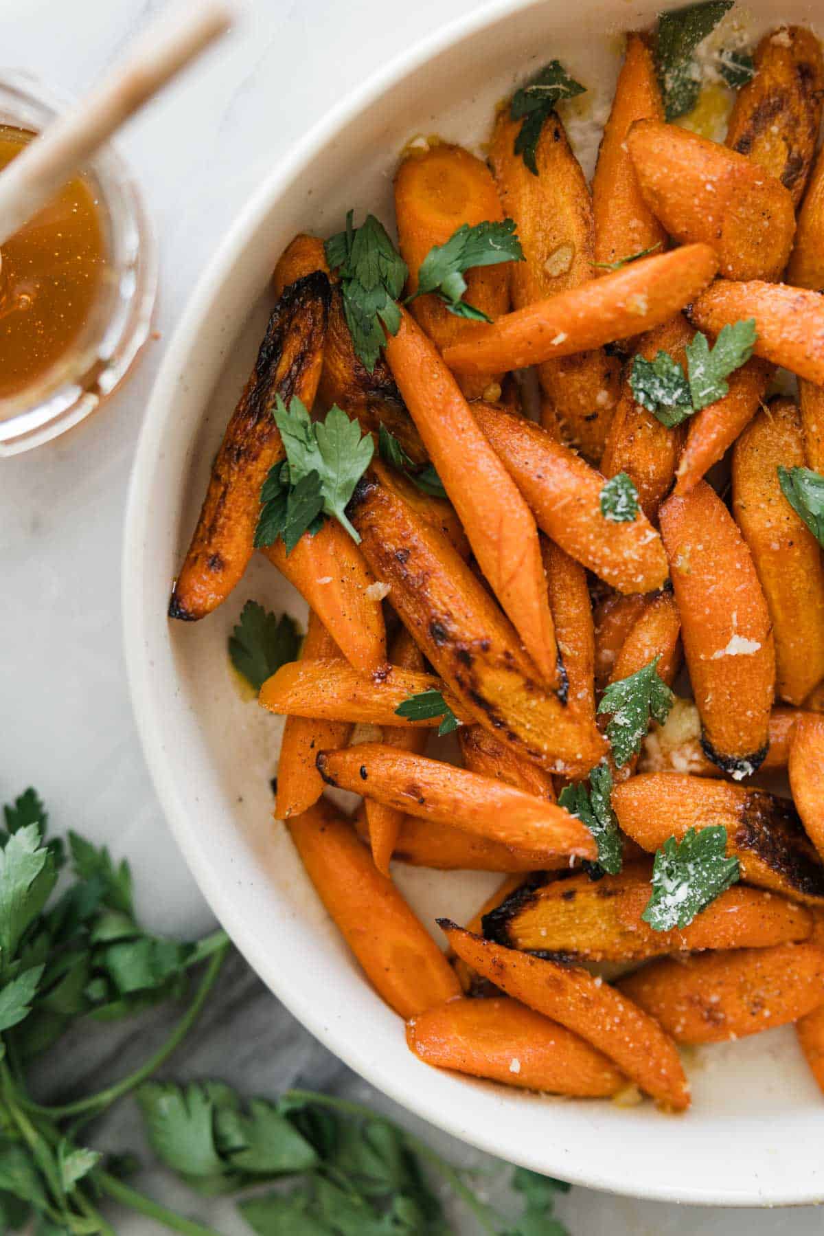 Honey glazed carrots in a serving dish.