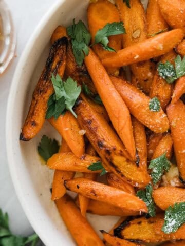 Honey glazed carrots in a serving dish.