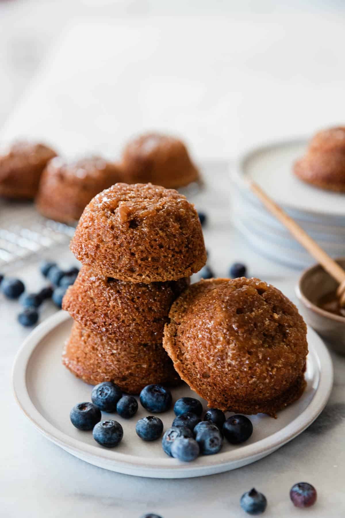 Raisin bran muffins on a plate.
