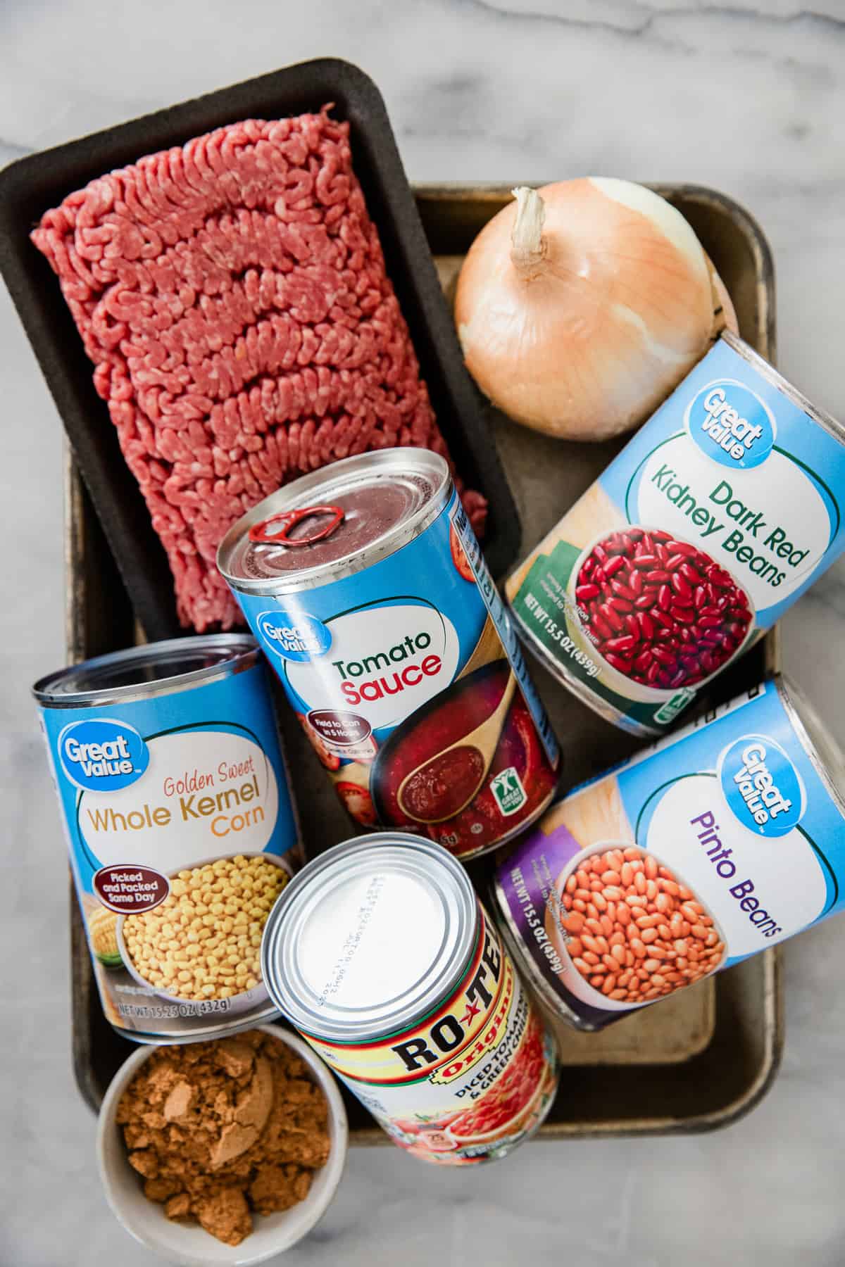 Ingredients to make this taco soup recipe on a table.