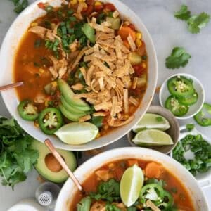 Chicken tortilla soup in bowls.