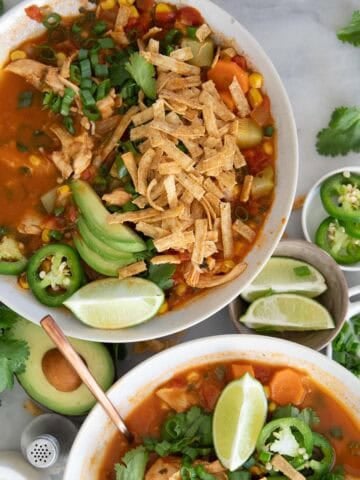 Chicken tortilla soup in bowls.