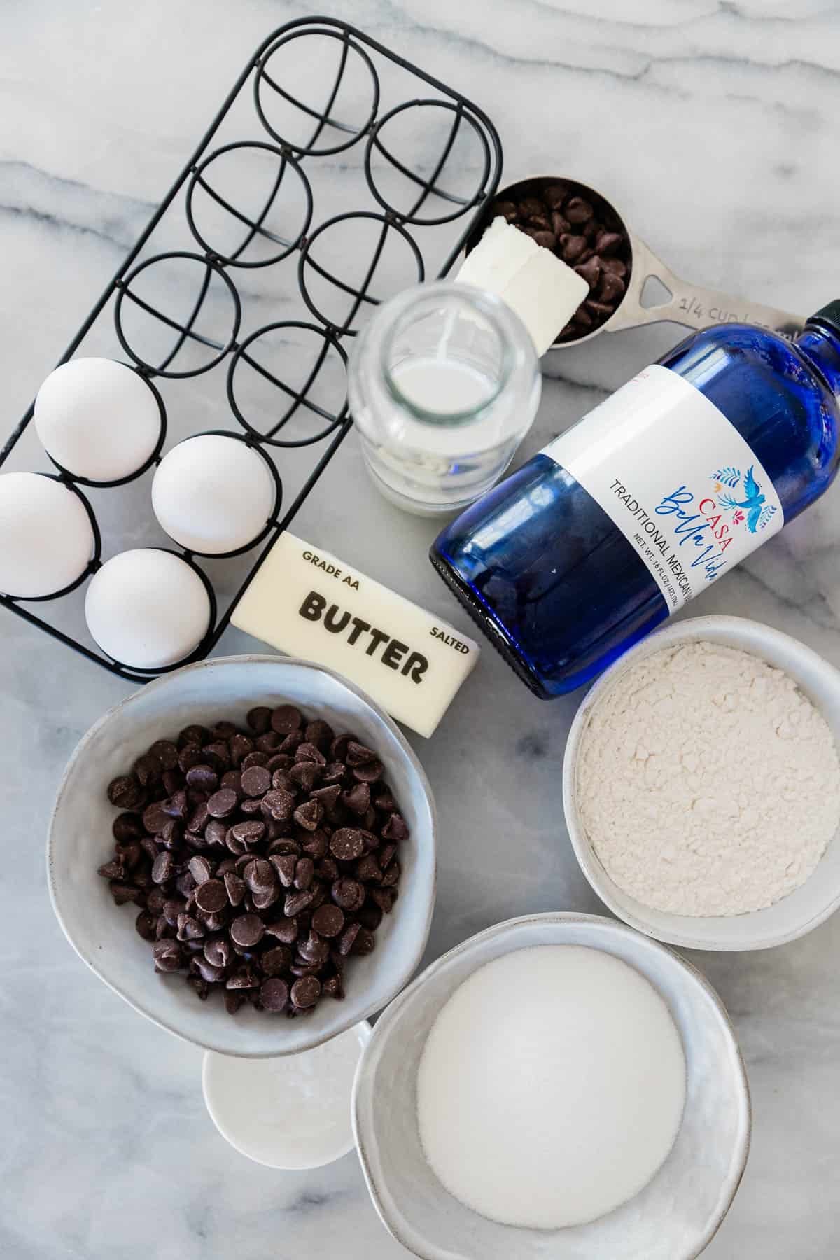 Ingredients to make chocolate lava cakes on a table.