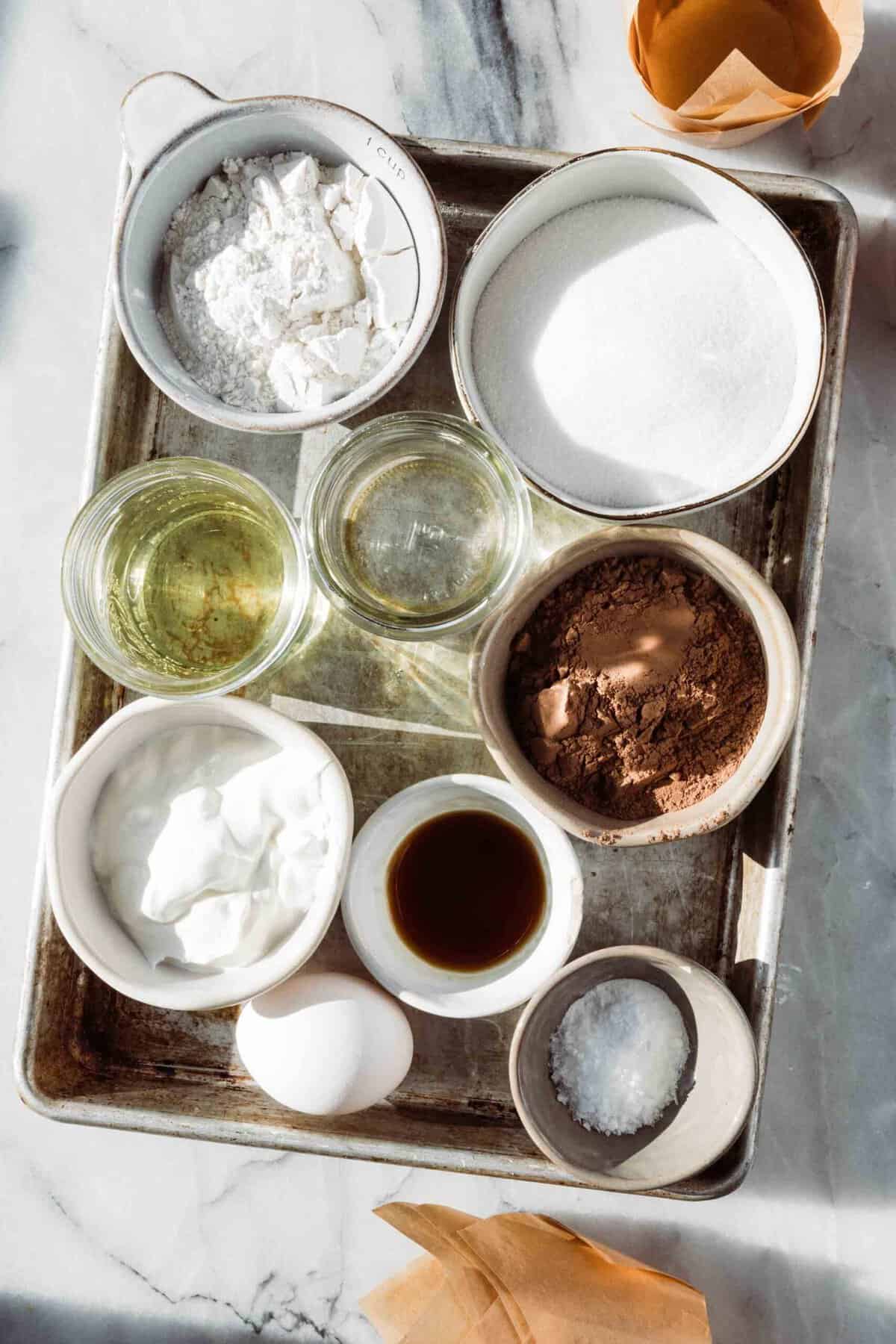 Chocolate cupcake ingredients on a baking tray. 